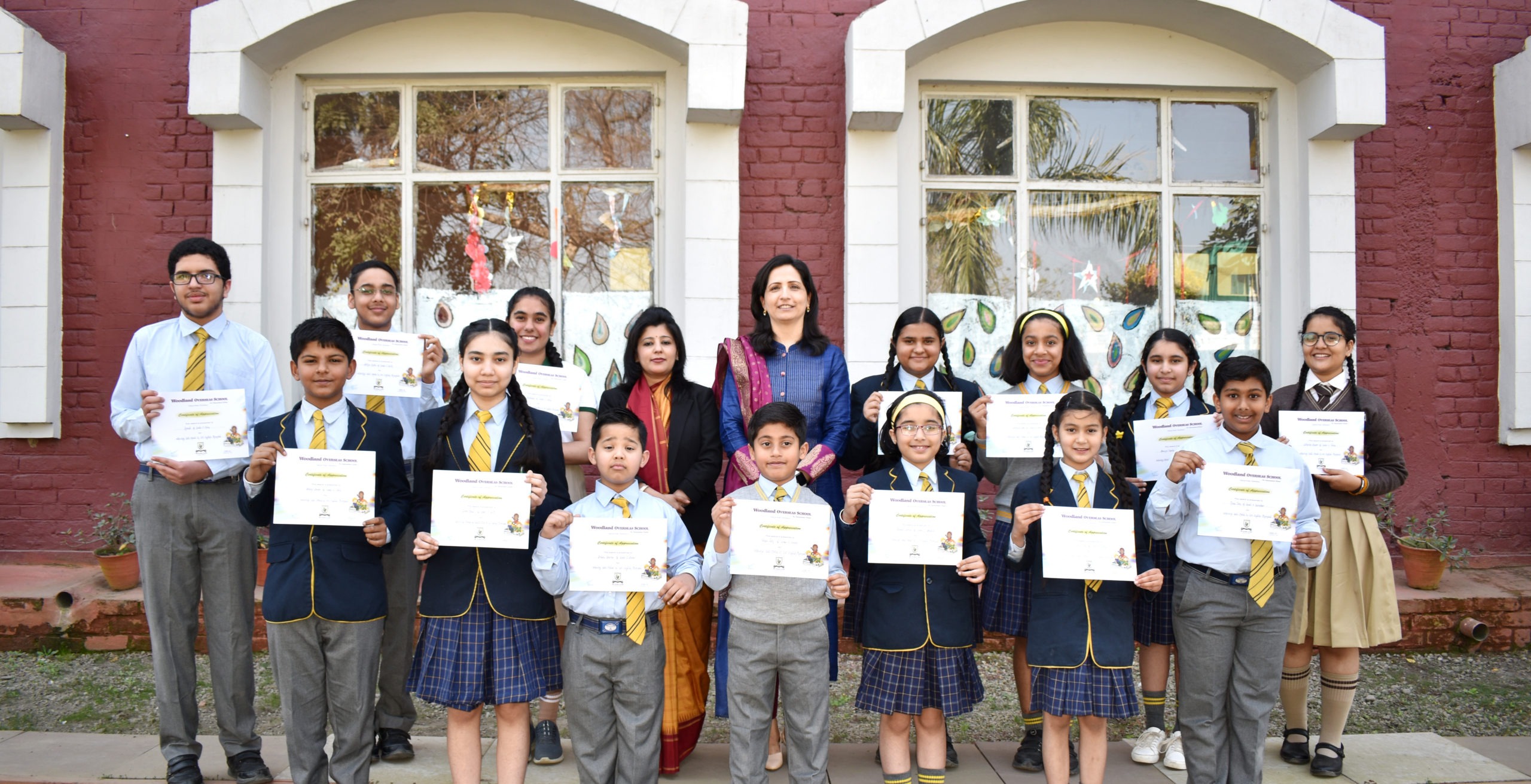 SOF International English Olympiad 12 Woodlanders Bagged Gold Medal of Excellence and 05 Woodlanders Secured Medal of Distinction